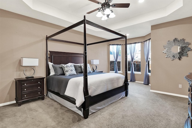 bedroom featuring light carpet and ceiling fan