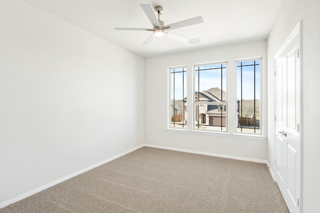 175 Creekside Dr, Sanger, TX 76266 - unfurnished room featuring visible vents, carpet, baseboards, and ceiling fan