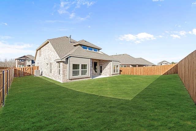 175 Creekside Dr, Sanger, TX 76266 - rear view of house with a fenced backyard, a lawn, cooling unit, and roof with shingles