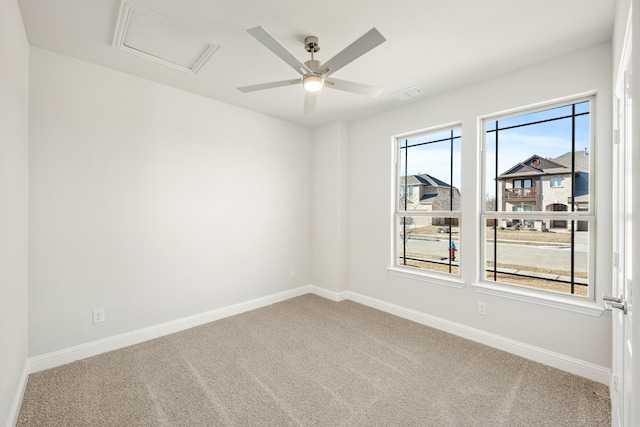175 Creekside Dr, Sanger, TX 76266 - carpeted spare room featuring attic access, baseboards, visible vents, and a ceiling fan