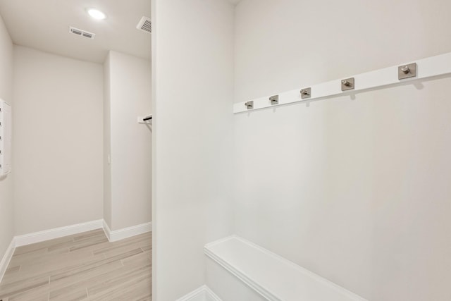 175 Creekside Dr, Sanger, TX 76266 - mudroom with light wood-type flooring, baseboards, and visible vents