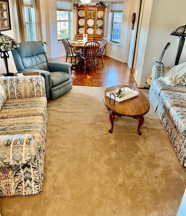 living room featuring parquet flooring