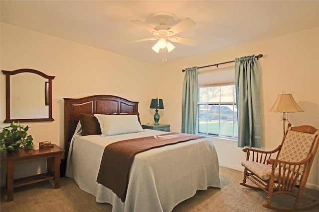 bedroom featuring ceiling fan and carpet flooring