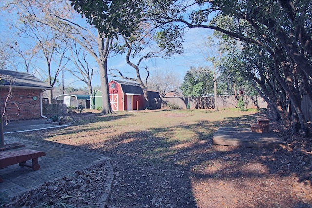 view of yard with a storage shed