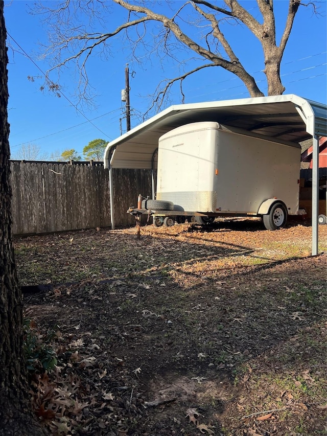 exterior space with a carport