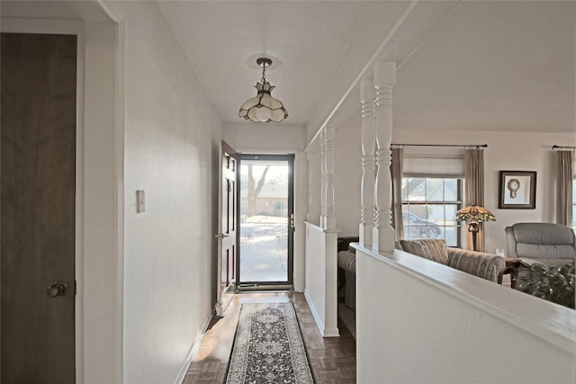 hall with parquet flooring