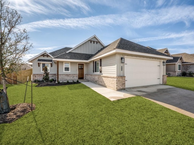 view of front of home featuring a garage and a front lawn