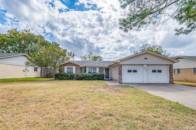 ranch-style house featuring a front yard and a garage