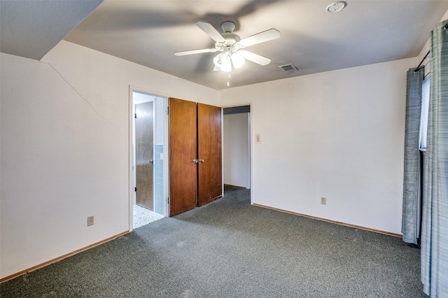 unfurnished bedroom with ceiling fan and carpet flooring