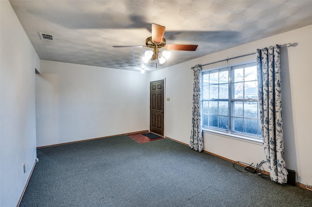 carpeted empty room with ceiling fan