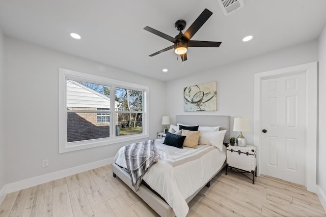 bedroom featuring ceiling fan and light hardwood / wood-style floors