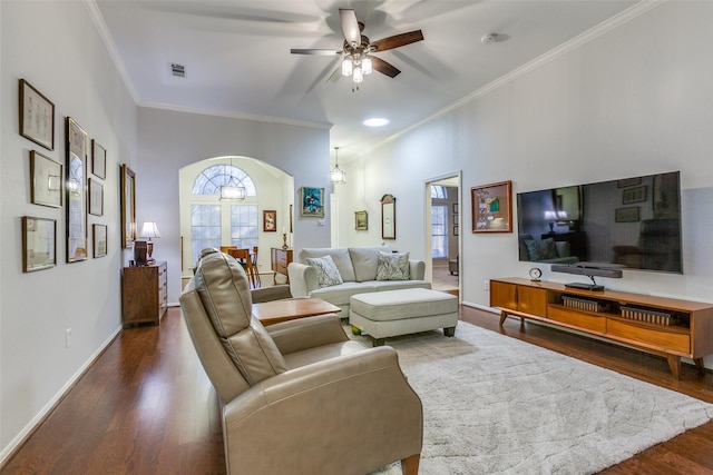 living room featuring ceiling fan, crown molding, and dark hardwood / wood-style floors