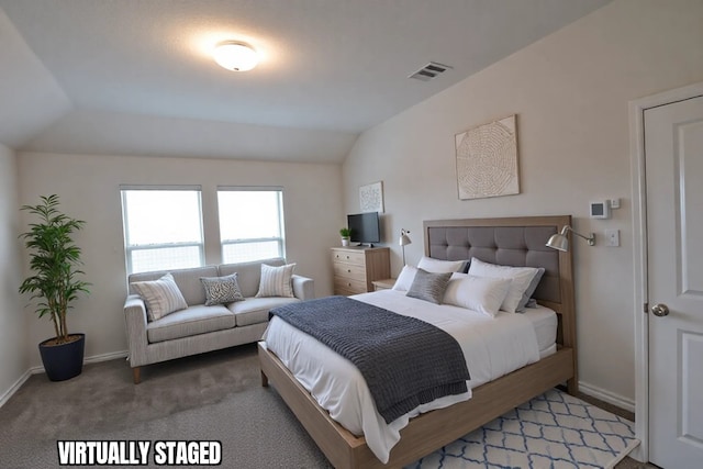 bedroom with carpet floors, visible vents, vaulted ceiling, and baseboards