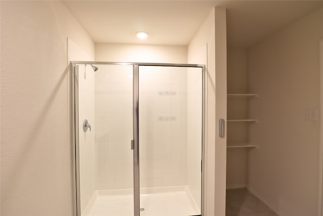 full bathroom with a shower stall