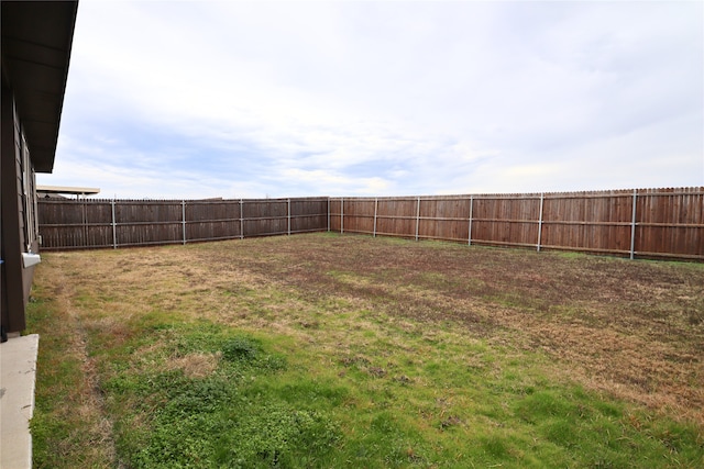 view of yard featuring a fenced backyard