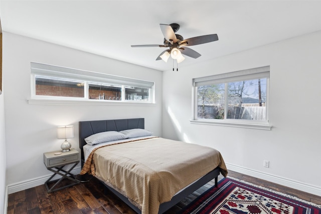 bedroom featuring dark hardwood / wood-style floors and ceiling fan