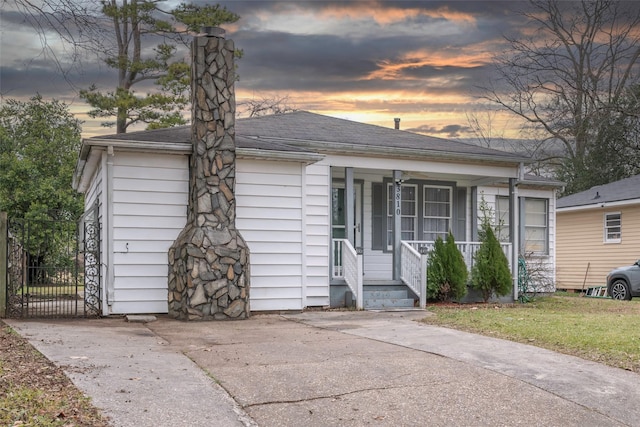 view of front of home featuring covered porch