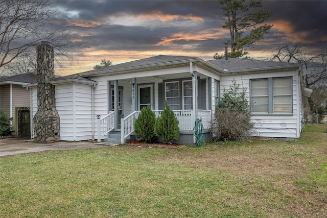 view of front of house with a lawn