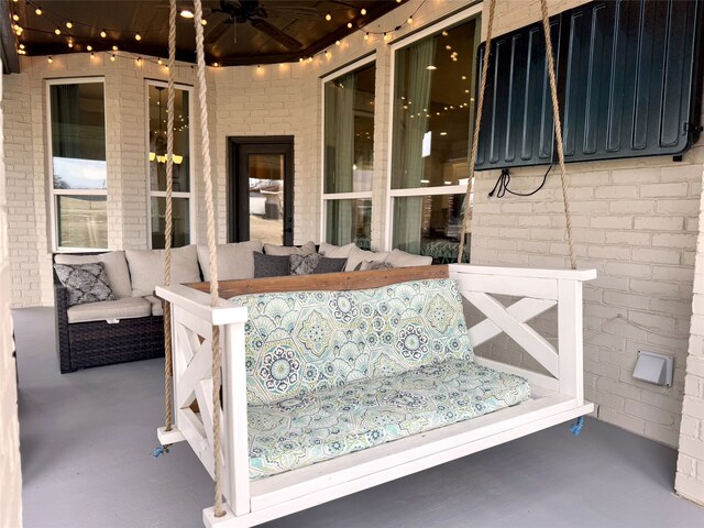 view of patio featuring an outdoor hangout area and ceiling fan