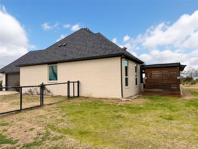 208 Grace Ln, Azle, TX 76020 - view of side of property with roof with shingles, brick siding, driveway, and a garage
