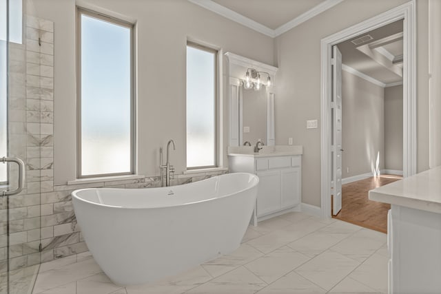 bathroom featuring independent shower and bath, ornamental molding, and vanity