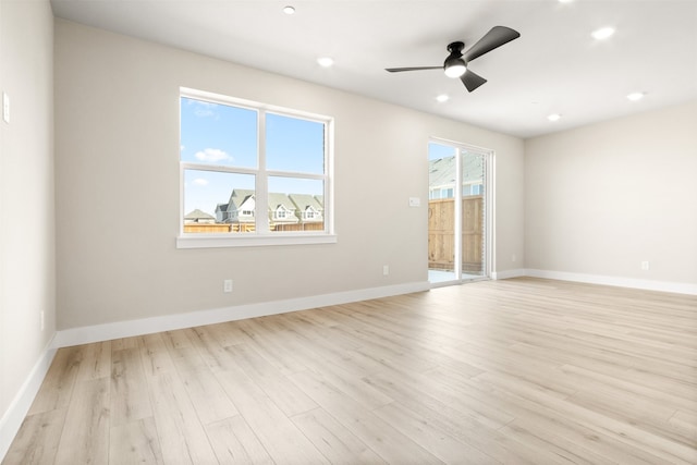 unfurnished room featuring light wood finished floors, ceiling fan, baseboards, and recessed lighting