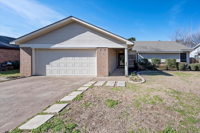 single story home with a garage and a front lawn