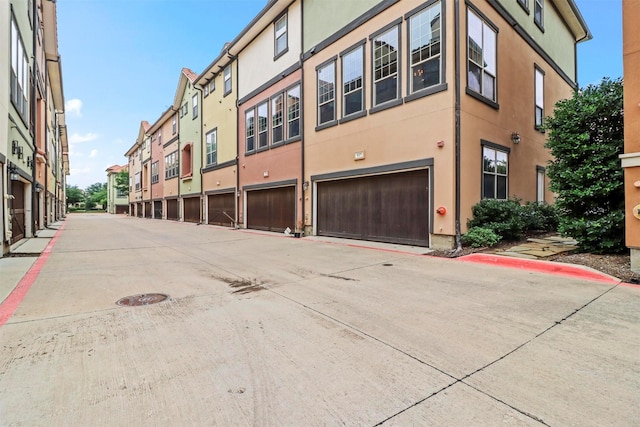 view of building exterior featuring a garage