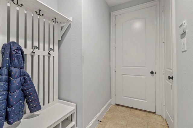 mudroom featuring light tile patterned flooring