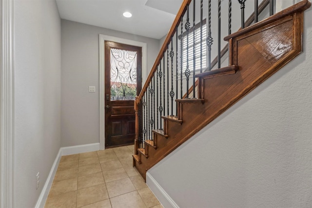 view of tiled foyer entrance