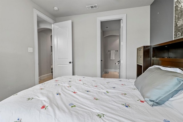 bedroom featuring ensuite bathroom