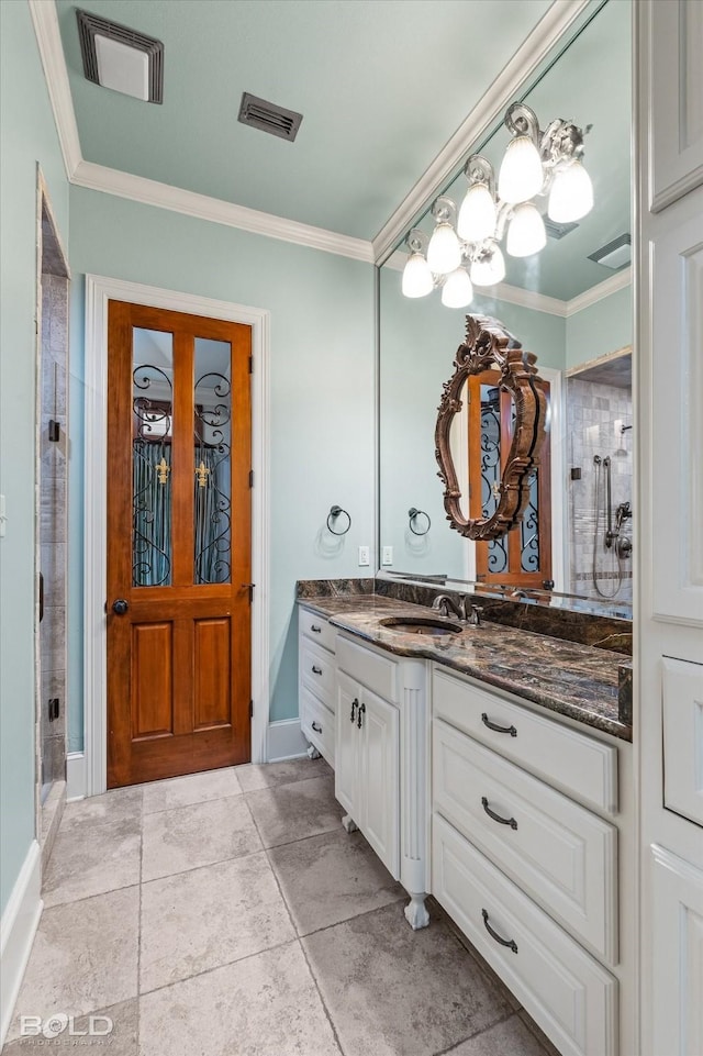 bathroom featuring crown molding, an enclosed shower, and vanity