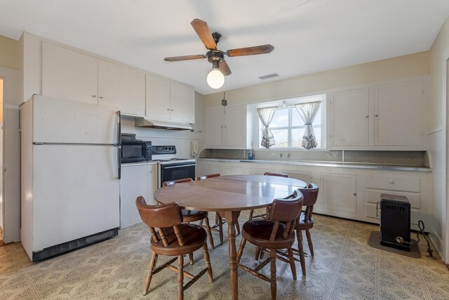 kitchen featuring ceiling fan, white cabinets, and white appliances