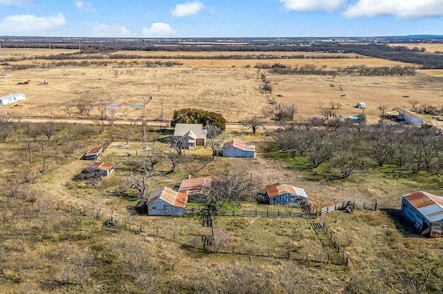 birds eye view of property featuring a rural view