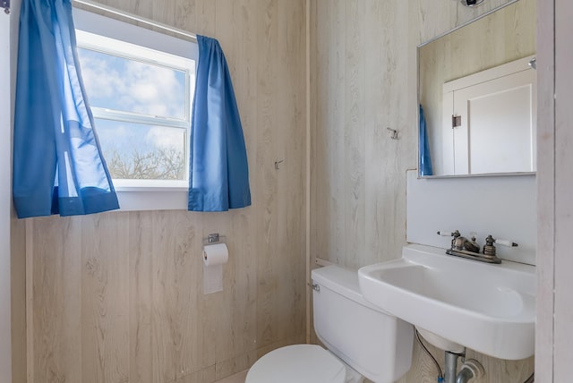 bathroom with toilet and sink