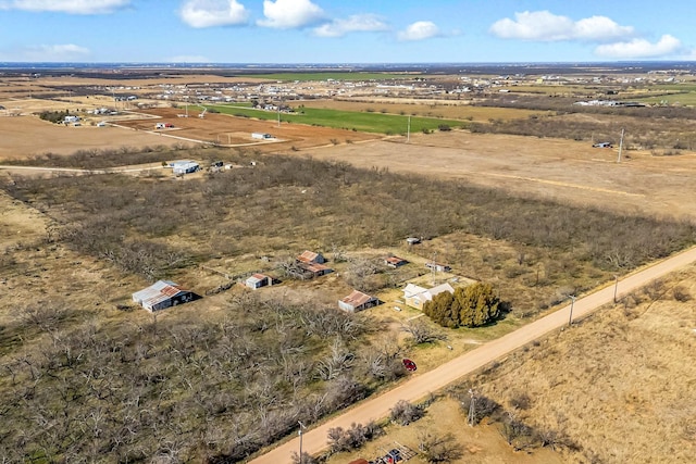 birds eye view of property featuring a rural view