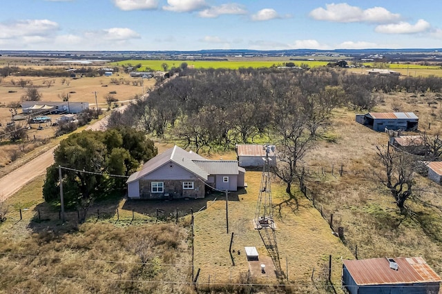 birds eye view of property featuring a rural view