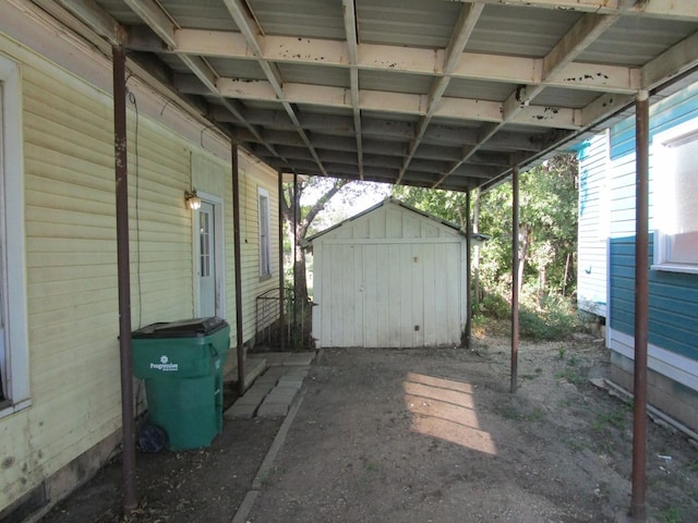 view of patio / terrace featuring a shed