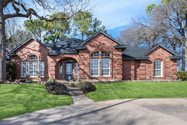 view of front of property with a front lawn