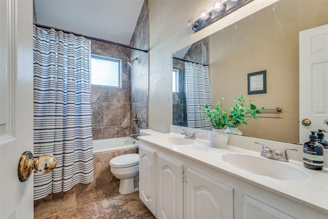 full bathroom with toilet, vanity, and shower / tub combo with curtain