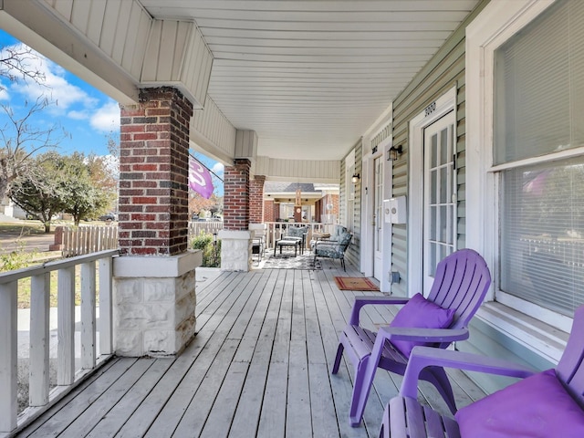 deck with covered porch