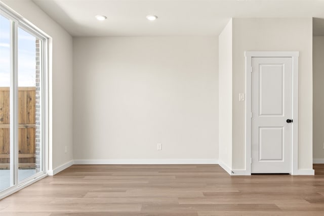 729 Tower Rd, Wylie, TX 75098 - unfurnished room featuring baseboards, recessed lighting, and light wood finished floors