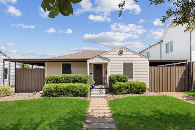 view of front of home with a front lawn