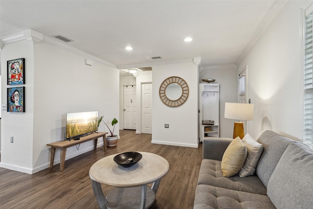 living area featuring crown molding, baseboards, visible vents, and dark wood-type flooring