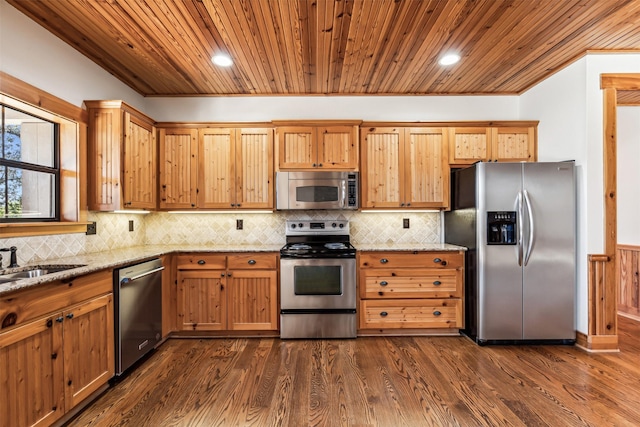 kitchen with dark hardwood / wood-style floors, sink, appliances with stainless steel finishes, light stone counters, and wooden ceiling