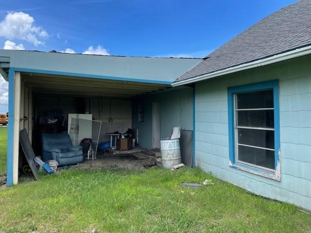 view of property exterior with a lawn