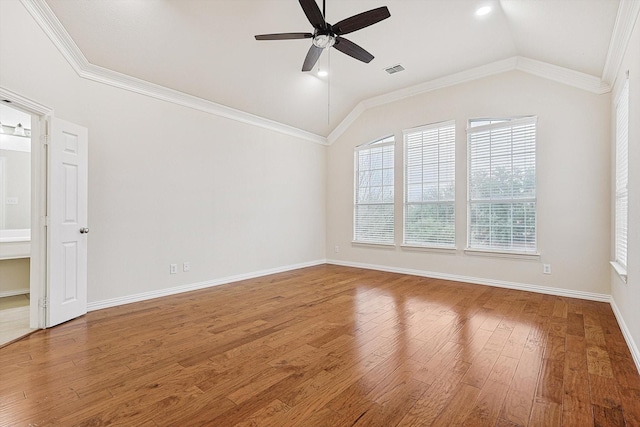 unfurnished room featuring ceiling fan, lofted ceiling, wood-type flooring, and crown molding