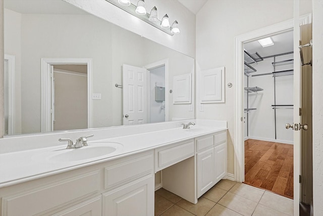 bathroom featuring vanity and tile patterned flooring