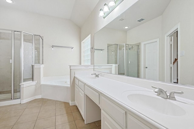 bathroom featuring plus walk in shower, tile patterned floors, and vanity