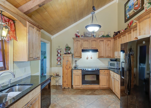 kitchen featuring sink, crown molding, dark stone countertops, black appliances, and decorative light fixtures